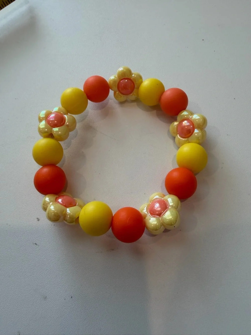 Hand Crafted Yellow and Orange Kids Flower Bead Stretch Bracelet - Picture 1 of 4